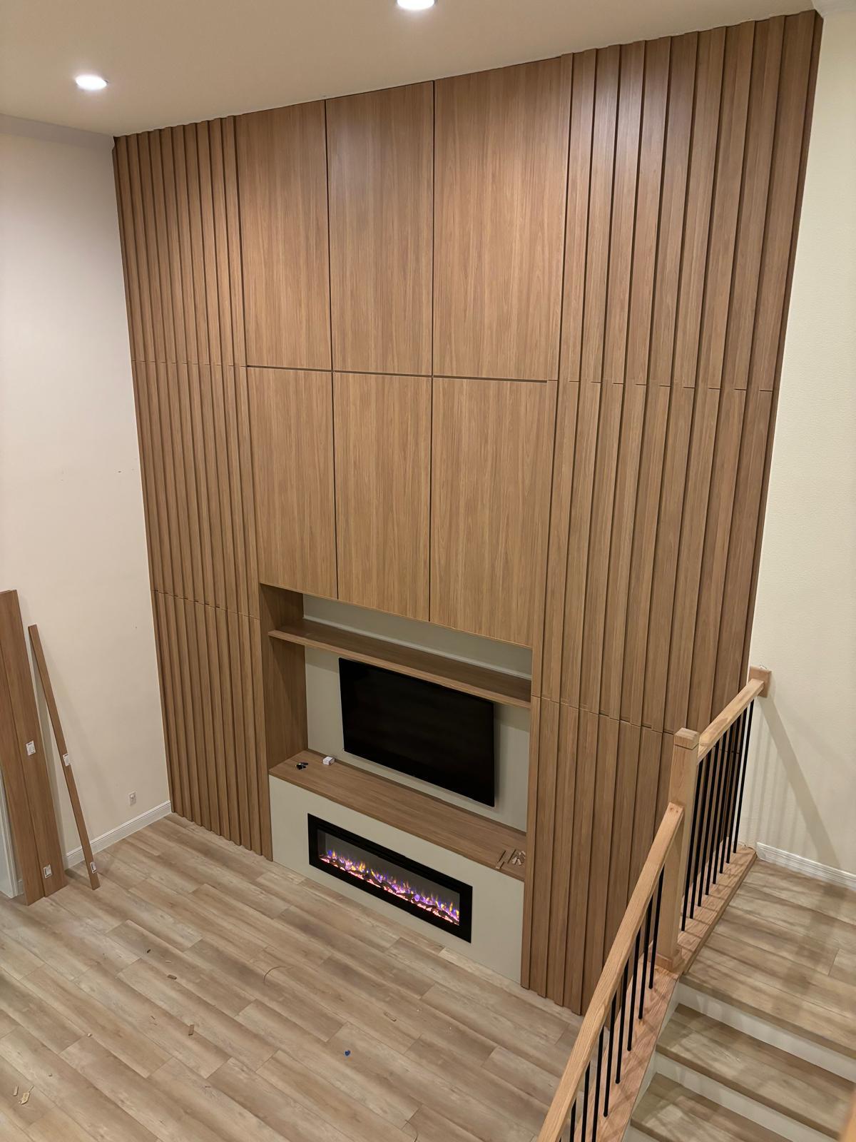 Living room media wall renovation — after